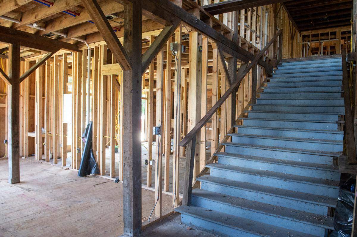 The main staircase at the new Farragut Lofts in Bay St. Louis on Thursday, June 30, 2022. The lofts are being built in the former McDonald Hardware & Lumber Co. which dates to 1905.