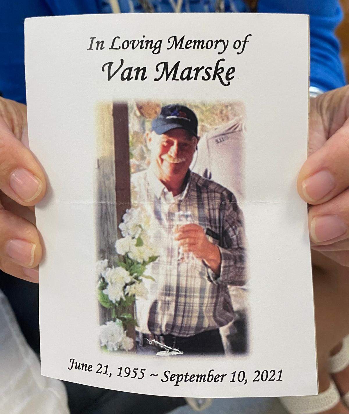 Marsha Schmitt holds a photo of her brother, Van Marske. His son, Noble Marske, pleaded guilty on July 21, 2023 to second-degree murder in the death of his father.