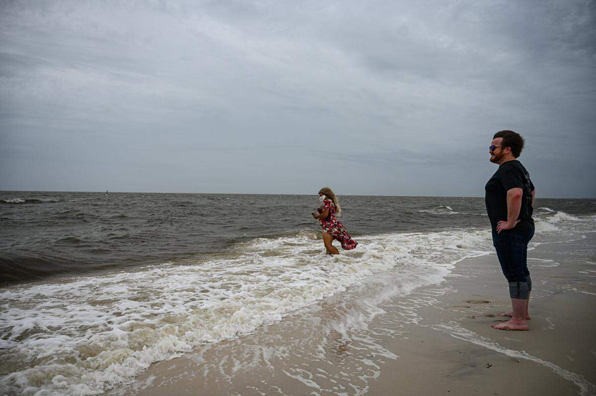 Hurricane Zeta drew weather watchers to the beaches in Biloxi before rainfall started Wednesday, Oct. 28, 2020.