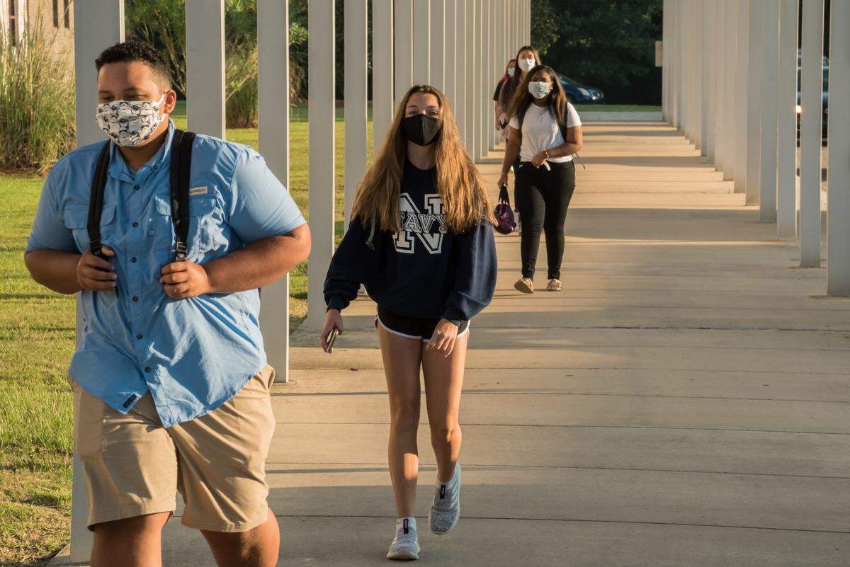 Students entering Biloxi High School on their first day amid the COVID-19 pandemic on August 5th, 2020.