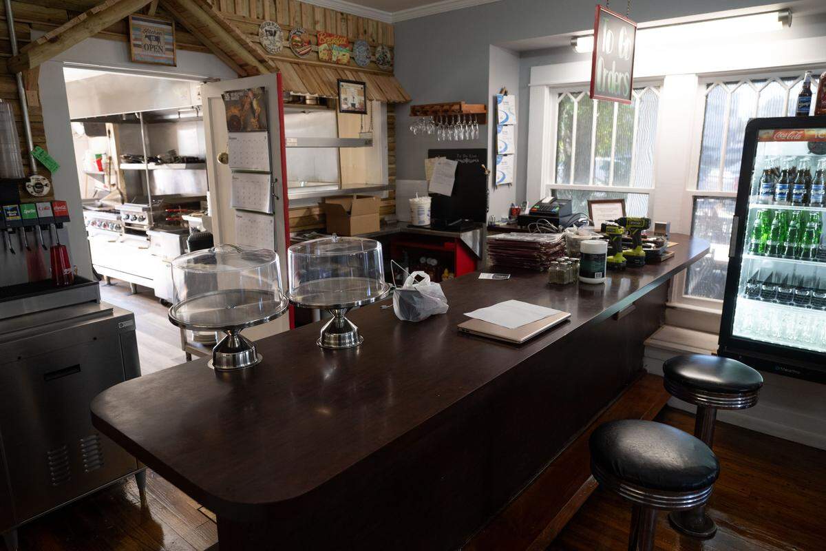 The counter bar with swivel seats is ready for customers at the Ole Biloxi Cafe on Howard Avenue..
