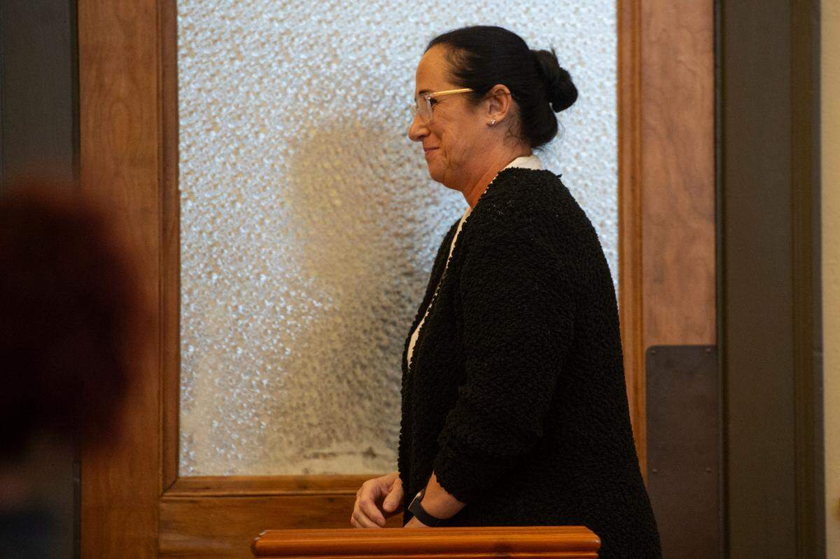 Connie Cuevas approaches the bench before the start of her sentencing in Hancock County Circuit Court in Bay St. Louis on Monday, June 3, 2024. Cuevas will serve one year in prison after multiple children were injured at her home day care.
