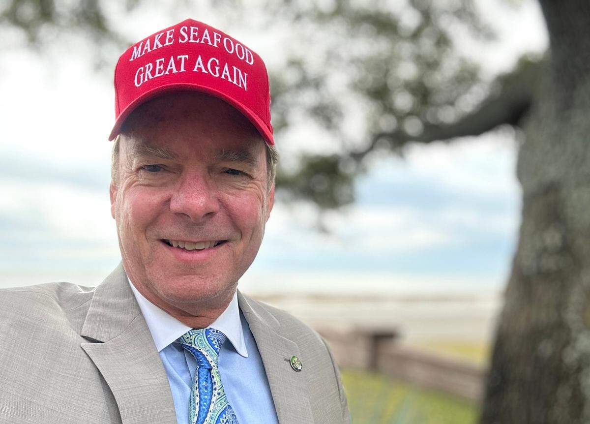 Gulfport Mayor Billy Hewes scored one of the popular caps handed out Wednesday at a Mississippi Coast legislative reception. The caps are designed to promote Gulf seafood.