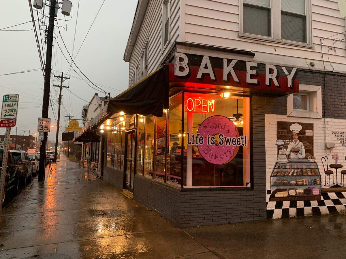 Nord’s Bakery stands on an early rainy morning in Louisville, KY on Feb. 16, 2023. The Germantown bakery is offering Mardi Gras cakes along with it’s famous donuts and cakes.