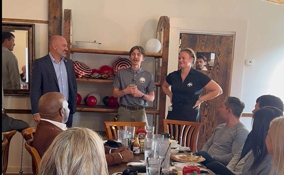 Two waiters, top right, were surprised with a $3,500 tip by a group of friends and business members who each gave a $100 breakfast tip at Lazy Oak restaurant in Ocean Springs.