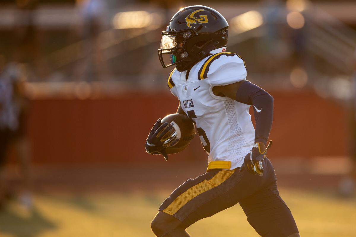 Gautier’s Kelvin Beavers runs the ball down the field during a Jamboree game at Biloxi High School on Friday, Aug. 18, 2023.