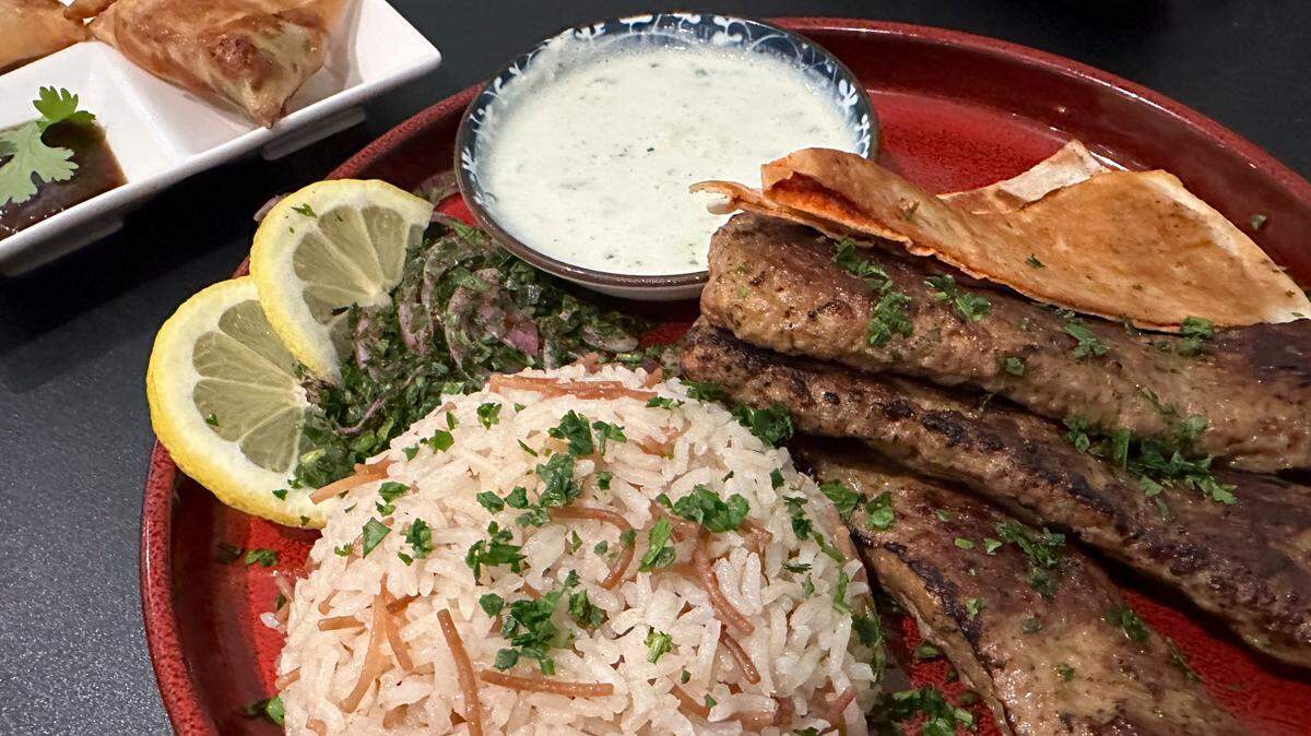 The seekh kabob entree at By the Fig and the Olive in Ocean Springs on Wednesday, July 10, 2024.