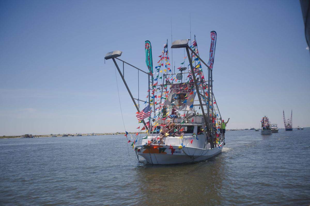 A decorated boat awaits its turn to receive blessings at the 2021 Blessing of the Fleet and Shrimp Festival in Biloxi. The event is a tradition each year.