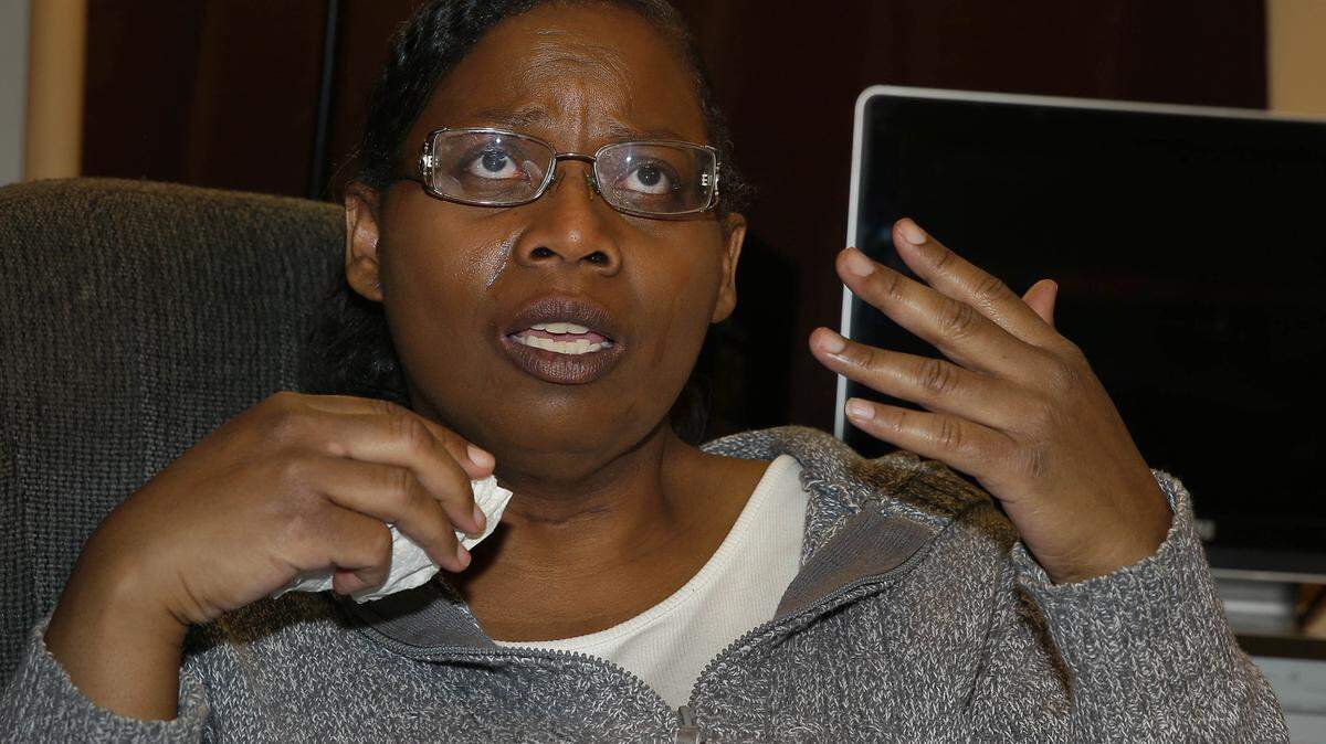 Karen McElwee Lloyd is overcome with emotion as she describes her mother's last few years in a nursing home on March 9, 2016 in Milwaukee, Wis. She is participating in Wisconsin Registry for Alzheimer's Prevention (WRAP) which is an effort to get African Americans to participate and be proactive in learning about how Alzheimer's affects the black community in growing numbers. (Rick Wood/Milwuakee Journal Sentinel/TNS)