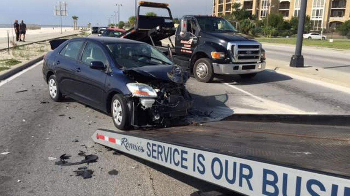 COURTESY GULFPORT POLICE 
 A four-car crash stalls traffic on Cowan Road and U.S. 90 early Thursday morning.