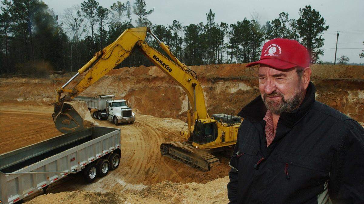 W.C. "Cotton" Fore is shown at one of his Harrison County dirt pits in 2002. A multimillionaire, Fore never put on airs. Instead, he worked hard all his life, investing his money in land and his construction businesses.