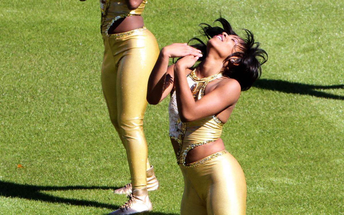 TIM ISBELL/SUN HERALDA member of the Alcorn State dance team performs at MGM Park during MLK Day parade and Battle of the Bands, Monday, Jan. 18, 2016.