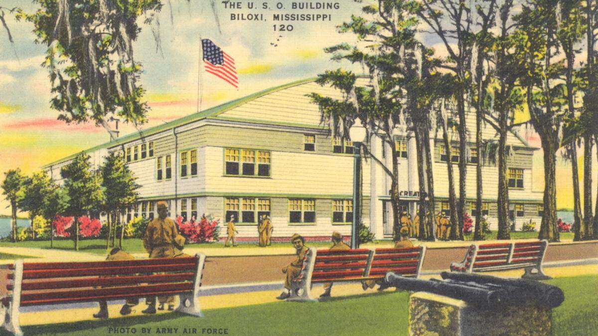 COURTESY/PAUL JERMYN COLLECTION 
 The Biloxi Community House became site of the USO during World War II, as this circa 1940s post card representing the "Army Air Force"indicates. The so-called Iberville cannons remain on public display. 