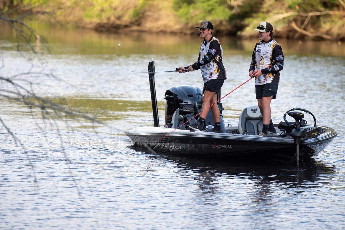 D’Iberville Bass Fishing Team members Cooper Rouse and Ryker Reed, left, fish on the Tchoutacabouffa River in D’Iberville on Monday, June 3, 2024. Reed and Rouse took home their second consecutive bass fishing state championship title in May.