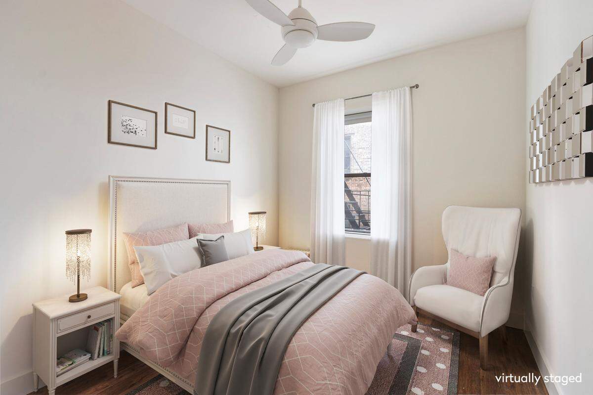 One of three bedrooms in the renovaed New York City apartment once rented by Barack Obama.