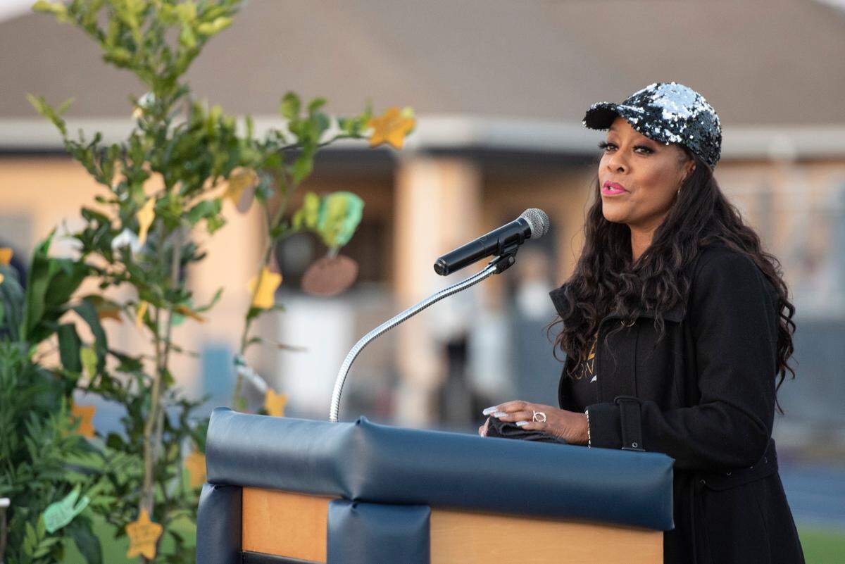 Dr. Yvonne Capehart, pastor at Healer Nation Healing Center, leads a prayer during a vigil for Shemarion Miner at Gautier High School in Gautier on Thursday, Jan. 16, 2025. Dr. Capehart will officiate Miner’s funeral.