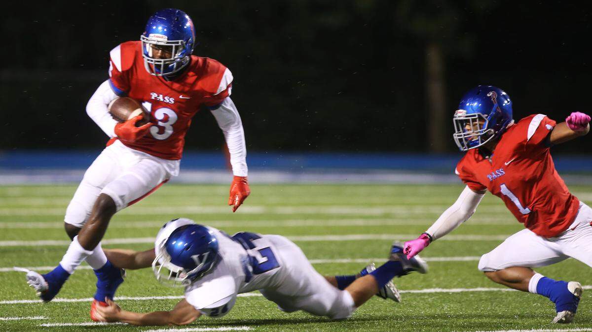 Pass Christian’s Andrew Moffett runs past a Vancleave defender as he carries the ball down the field Oct. 18, 2019.