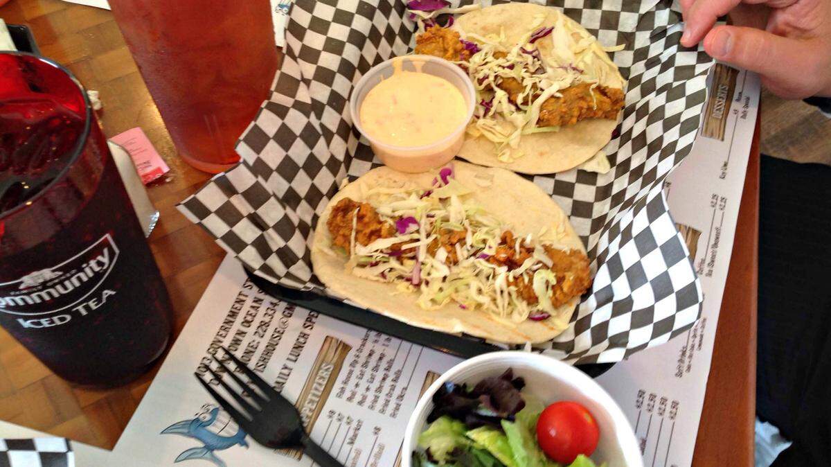 MARY PEREZ/SUN HERALDFish tacos are one of several varieites of tacos served at the new Hook Fish House in downtown Ocean Springs.