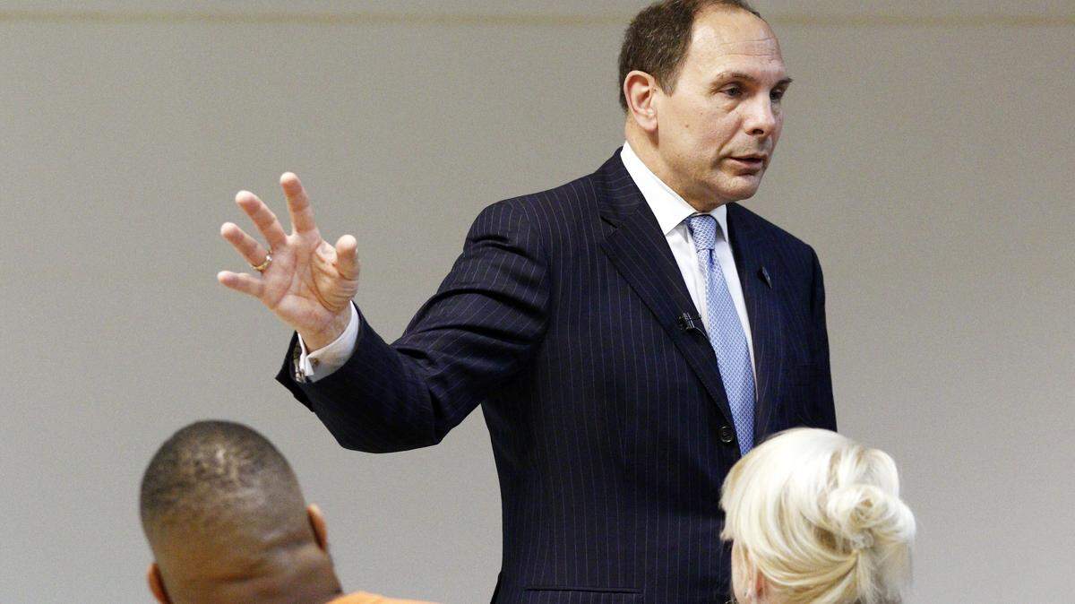 Department of Veterans Affairs Secretary Robert McDonald, left, answers questions from health care workers, veterans, and the public during an open Town Hall meeting in Jackson, Miss., Friday, Feb. 5, 2016. McDonald's appearance at the G.V. (Sonny) Montgomery VA Medical Center was to answer veteran treatment questions and learn about the health care dispensed. (AP Photo/Rogelio V. Solis)