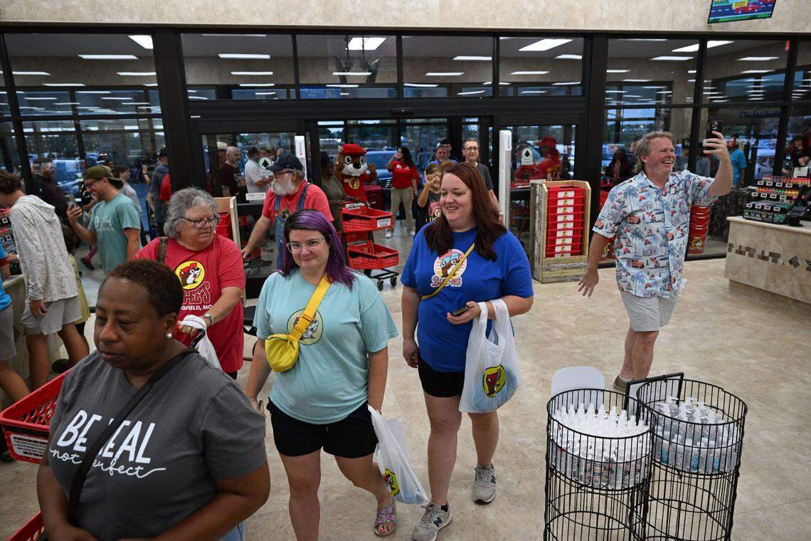 Some of the first customers pour through the doors Monday, June 9, 2025, after the opening of the Buc-ee’s in Harrison County.