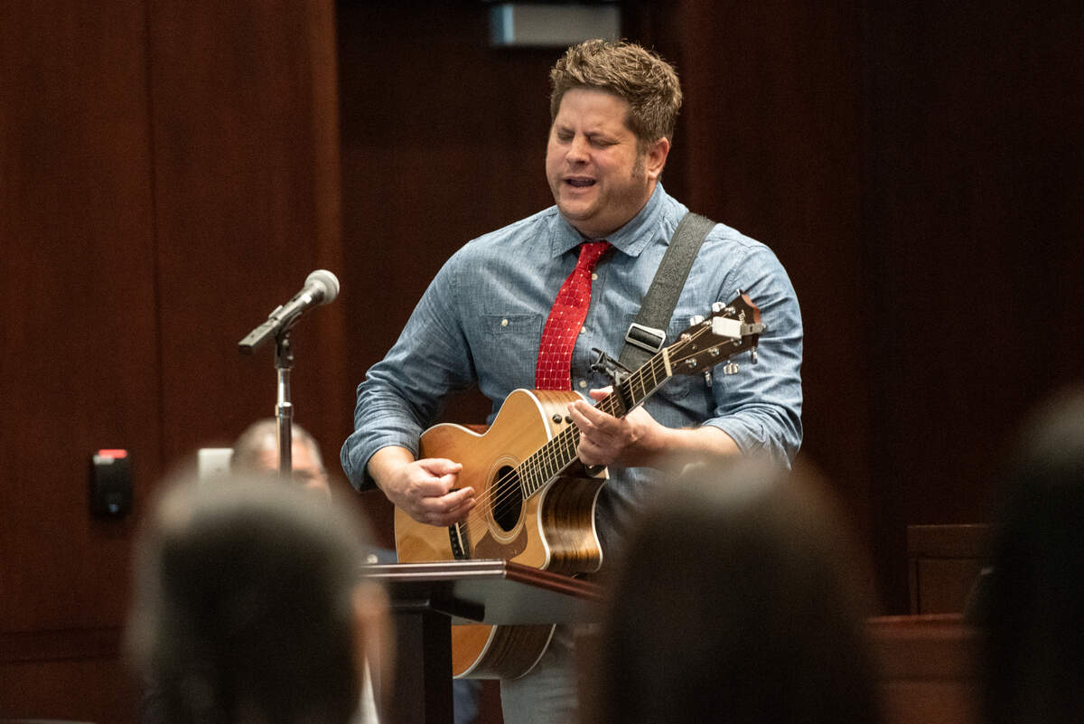 Donnie Dennis sings “America the Beautiful” during a naturalization ceremony at Dan M. Russell Courthouse in Gulfport on Thursday, Oct. 19, 2023.