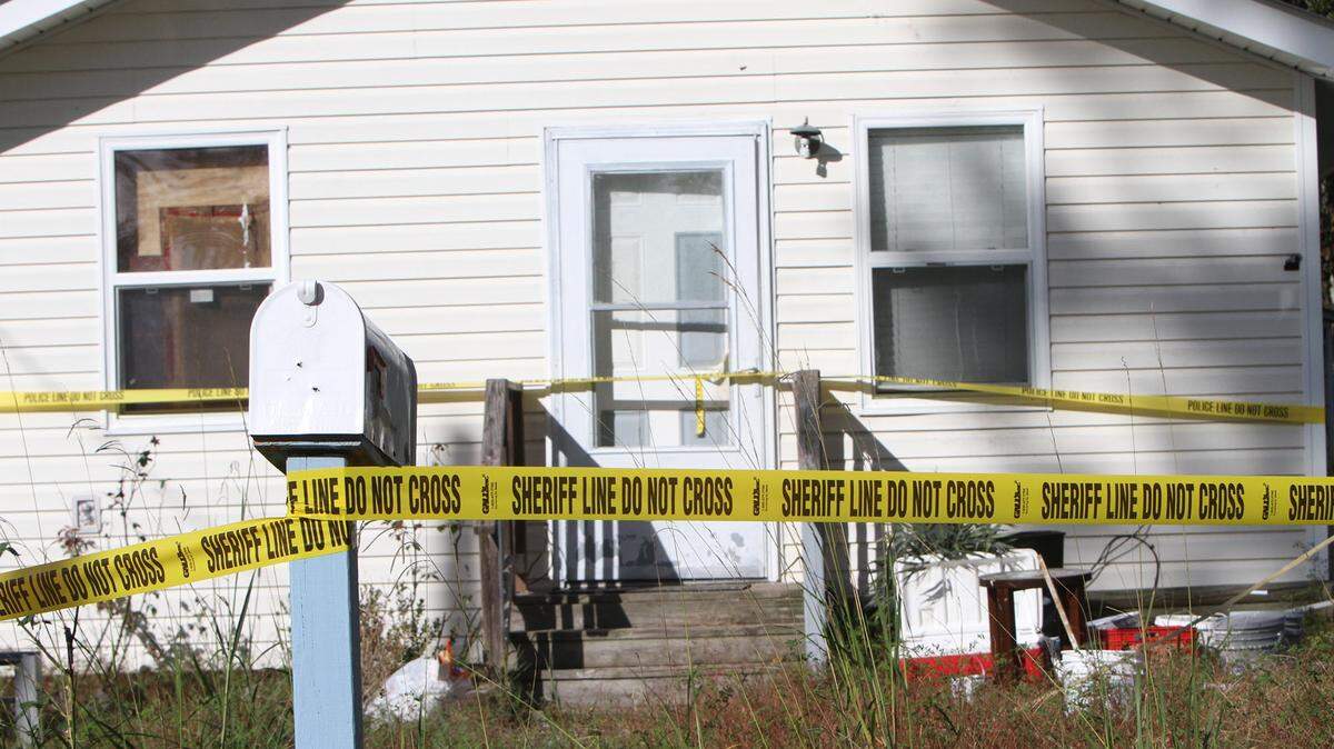 Crime scene tape surrounds Jason Duffy's house on Dicks Street in Waveland on Nov. 30. Duffy was shot to death there on Nov. 29.