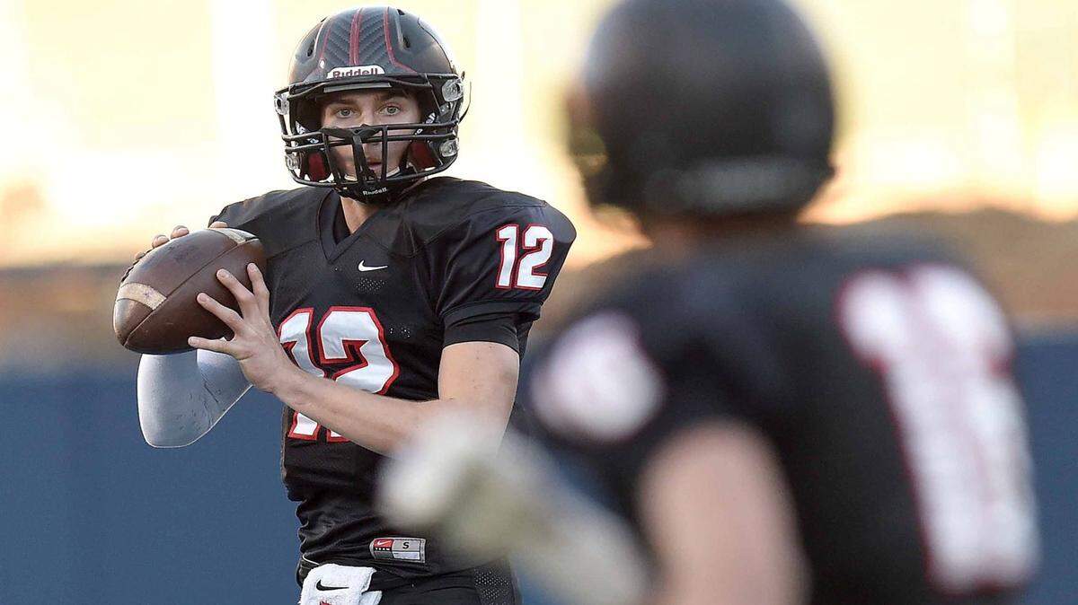 CHRIS TODD/SPECIAL TO THE SUN HERALD/FILE 
 St. Stanislaus quarterback Myles Brennan (12) is headed to Los Angeles to compete in the prestigious Elite 11 Finals. Out of the 24 quarterbacks in the competition, 11 will advance to The Opening Finals in Beaverton, Ore., in July.