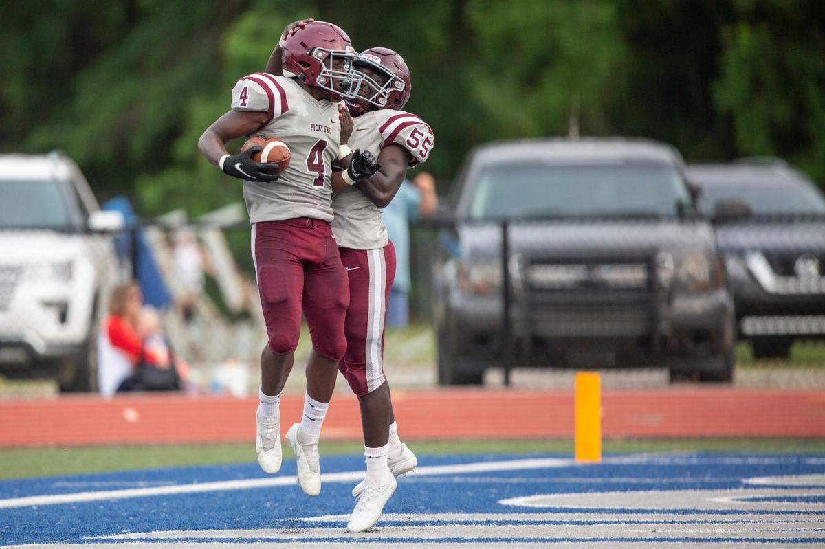 Darrell Smith celebrates in the end zone after scoring a touchdown during a spring game against Ocean Springs at Greyhound Stadium in Ocean Springs on Friday, May 13, 2022.