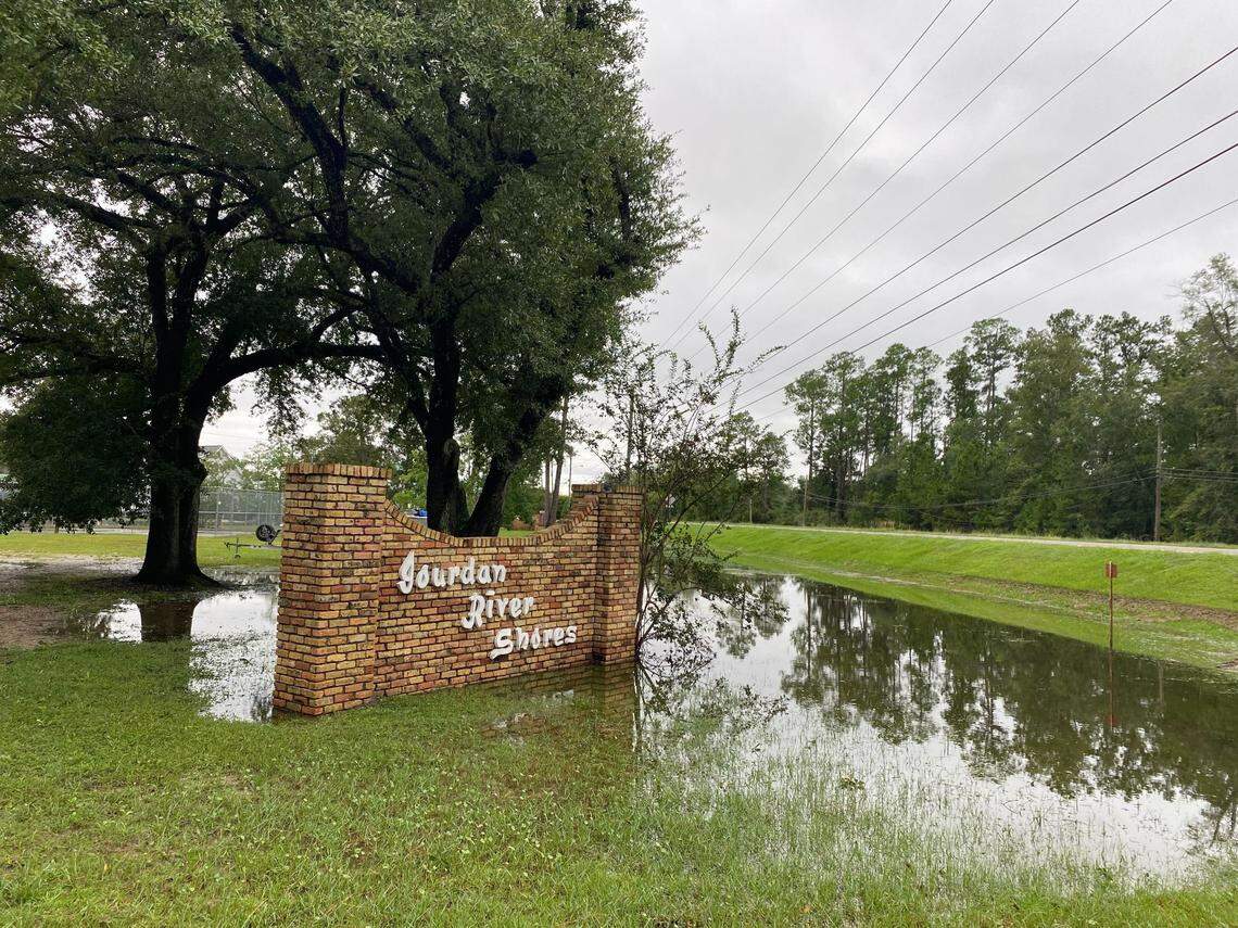 The sign at Jourdan River Shores at Kiln shows some high water from Hurricane Francine, but not the levels seen in past storms.