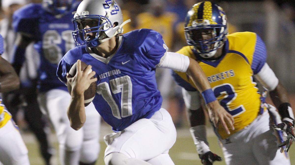 TIM ISBELL/SUN HERALD 
 Ocean Springs quarterback Drew Windham will lead the Greyhounds into a Region 4-6A clash on Friday at Milner Stadium. The winner of Ocean Springs-Gulfport will claim the region.