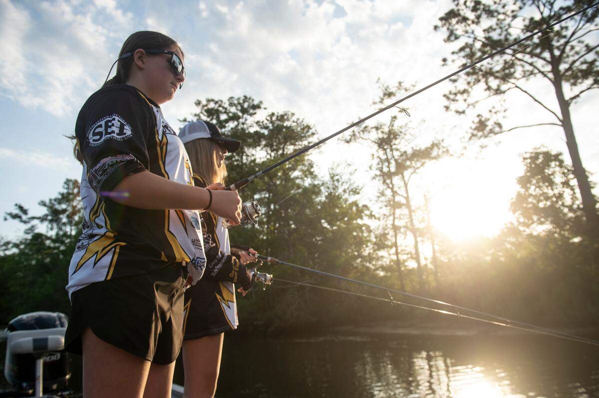 D’Iberville Bass Fishing Team members Olivia King, left, and Harper Krohn fish on the Tchoutacabouffa River in D’Iberville on Monday, June 3, 2024. In May, King and Krohn became Mississippi’s first-ever all-girls bass fishing state champions out of the junior division.
