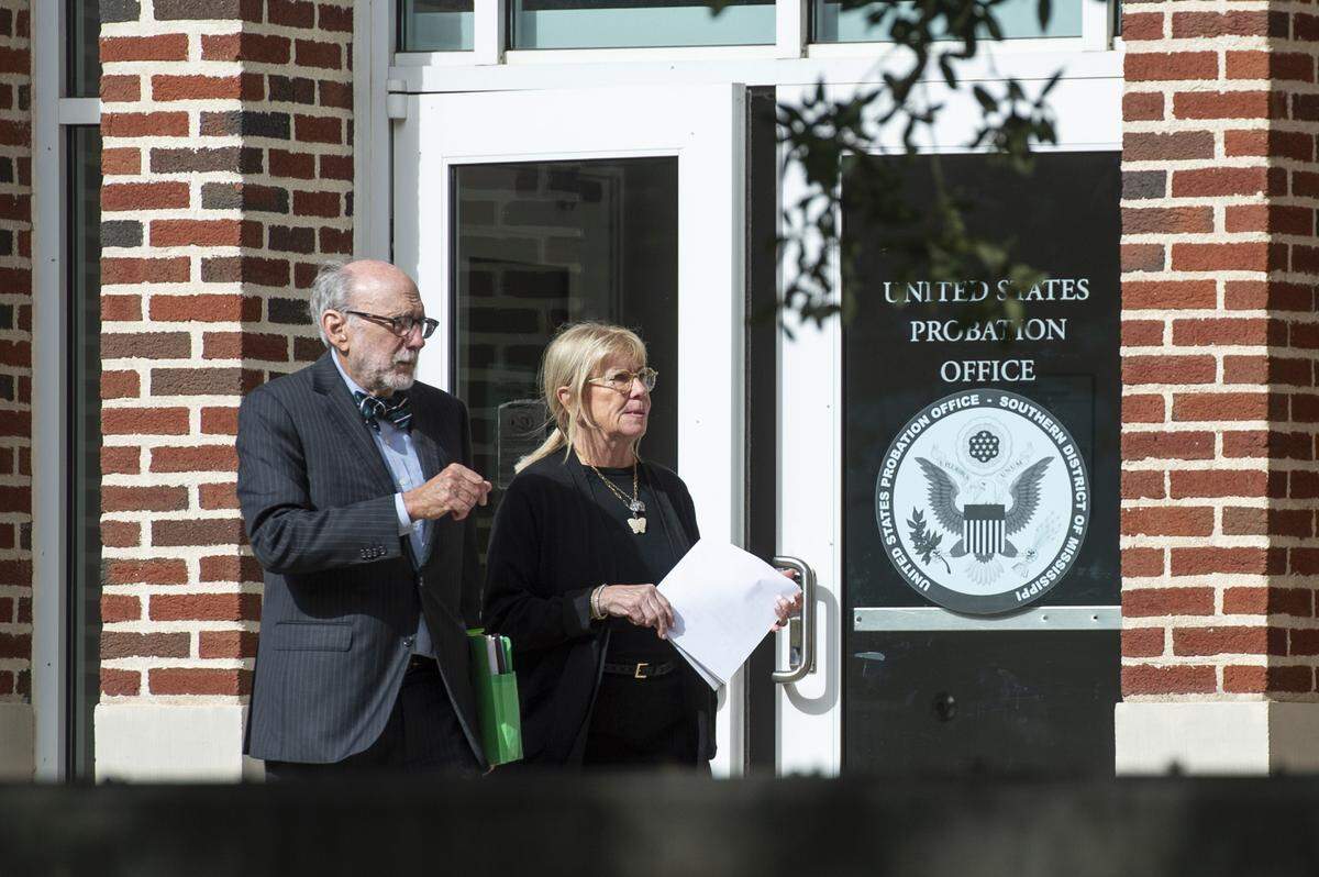 Eileen Mahoney Ezell and her attorney, Arthur Madden, leave the U.S. Probation Office at Dan M. Russell Federal Courthouse in Gulfport on Monday, Nov. 18, 2024, after Mary Mahoney’s and Anthony Cvitanovich were sentenced in a federal case involving mislabeling seafood. Ezell served as the company’s corporate representative.
