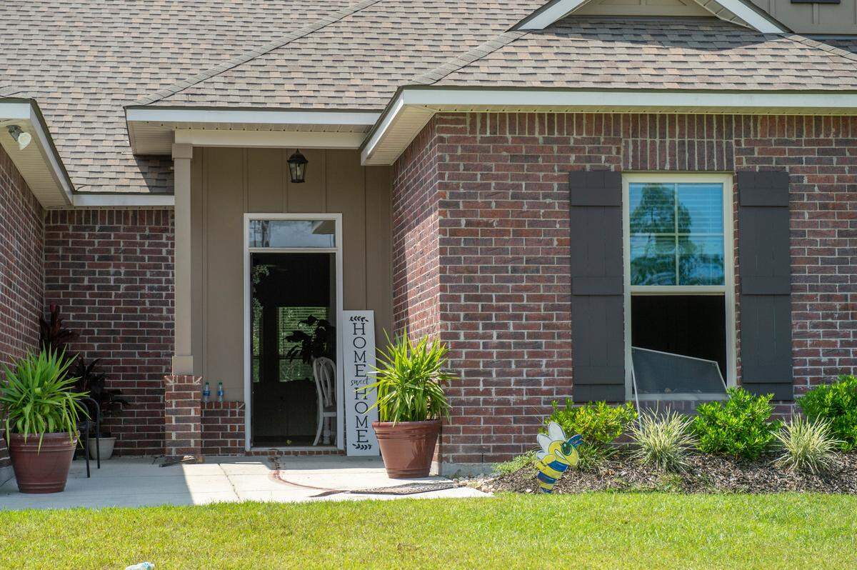 The front door and front window of a home on Brookstone Drive in St. Martin after a standoff situation at the home on Thursday, Sept. 9, 2021.