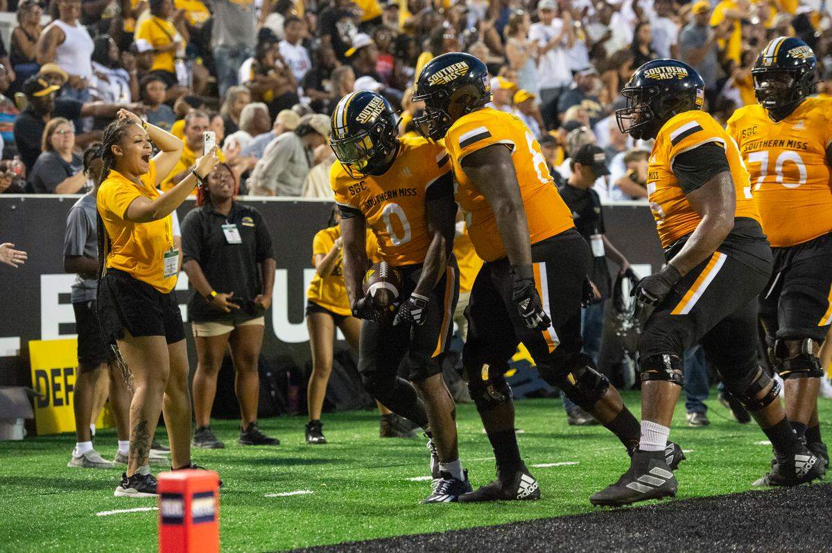 Southern Miss Golden Eagles running back Rodrigues Clark (0) celebrates a touchdown during a Southern Miss game at M.M. Roberts Stadium in Hattiesburg on Saturday, Sept. 2, 2023. The touchdown was overturned after a flag on the play.