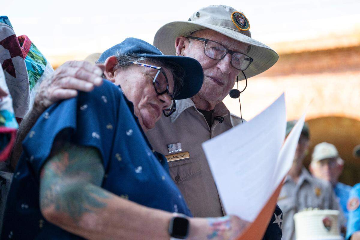 Jack Madison, a volunteer tour guide for Gulf Islands National Seashore, is presented with a quilt from Quilts of Valor and a birthday cake after his final tour of Fort Massachusetts on Ship Island on Friday, July 11, 2025 — his 100th birthday.