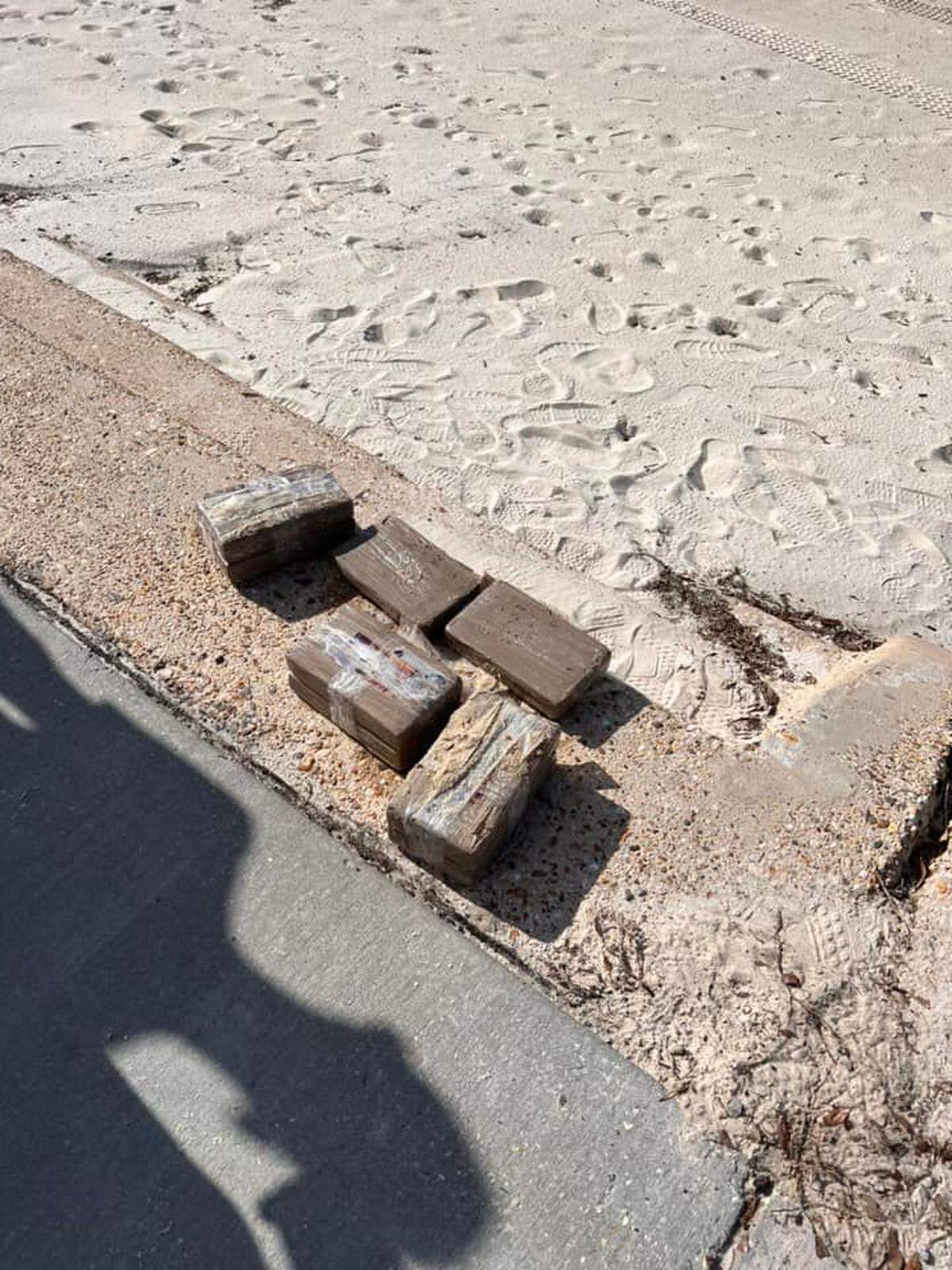 Eight bricks of apparent narcotics were found during a weekly cleanup by Keesler Airforce workers.