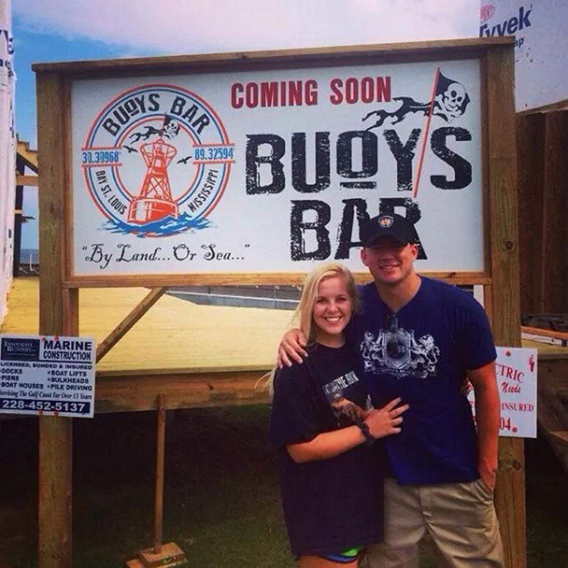 Roger Caplinger’s daughter, Claudia, poses with actor Channing Tatum in front of Caplinger’s Buoys Bar in Bay St. Louis in 2014. Tatum grew up in the Gautier and Pascagoula area in South Mississippi.