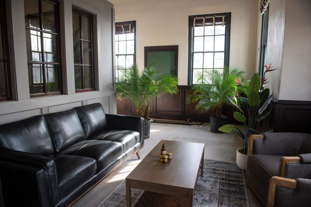 A seating area in what will be the barbershop section at Fairly Local, a new menswear shop in the old post office building in Bay St. Louis on Thursday, Dec. 7, 2023. The shop, which is the second in a small chain, will also have a massage parlor, coffee shop, humidor for cigars and a variety of menswear brands.