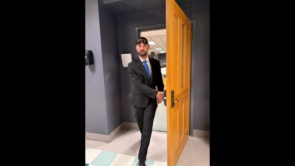 Former Moss Point Police Officer Craig Chandler walks out of Jackson County Court on Monday, Feb. 9, 2026, before his second trial in a domestic violence case. He appealed his conviction in Jackson County Justice Court.