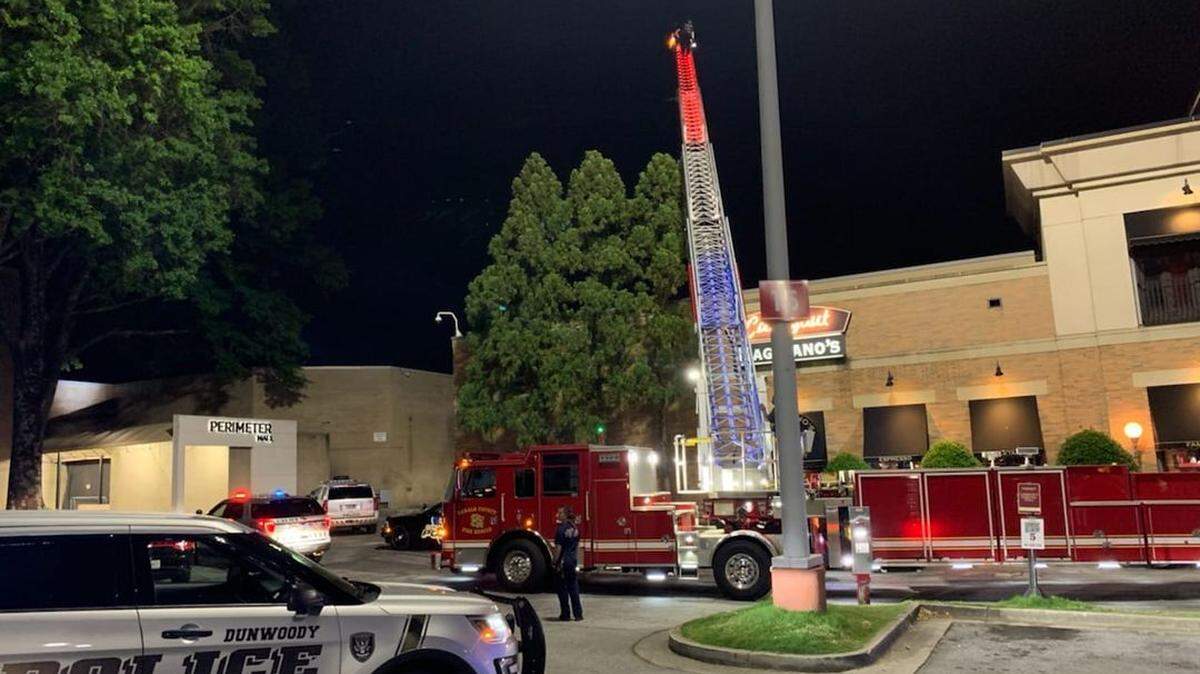 A man accused of breaking into cars had to be rescued after climbing onto the roof of the Cheesecake Factory at Perimeter Mall in Georgia, according to the Dunwoody Police Department.