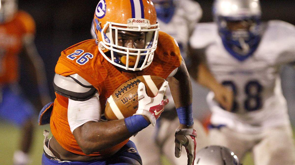 TIM ISBELL/SUN HERALD 
 Gulfport running back sprints for a first down against Ocean Springs, Friday, Oct. 30, 2015.