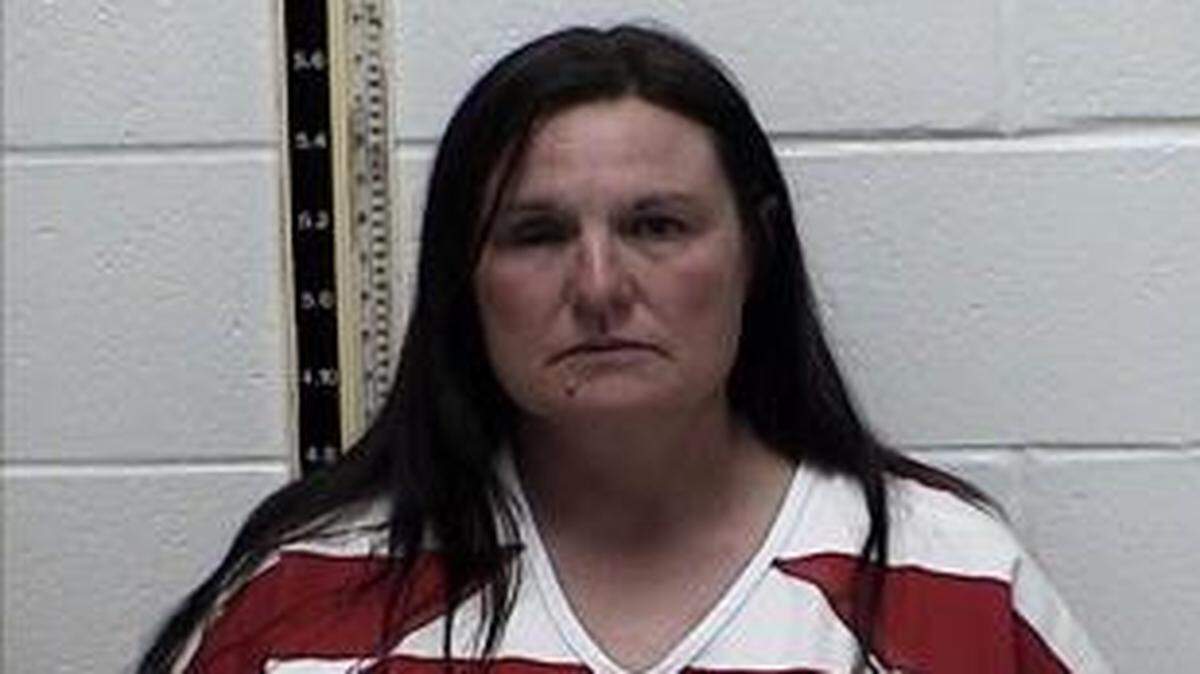 Tanya Lindell Saucier, 49, is held in the Pearl River County jail on a murder charge in connection to her estranged husband’s shooting outside the courthouse.