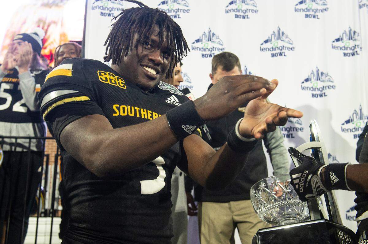 Southern Miss’ Frank Gore Jr. celebrate after winning the Lending Tree Bowl at Hancock Whitney Stadium in Mobile, Alabama on Saturday, Dec. 17, 2022.