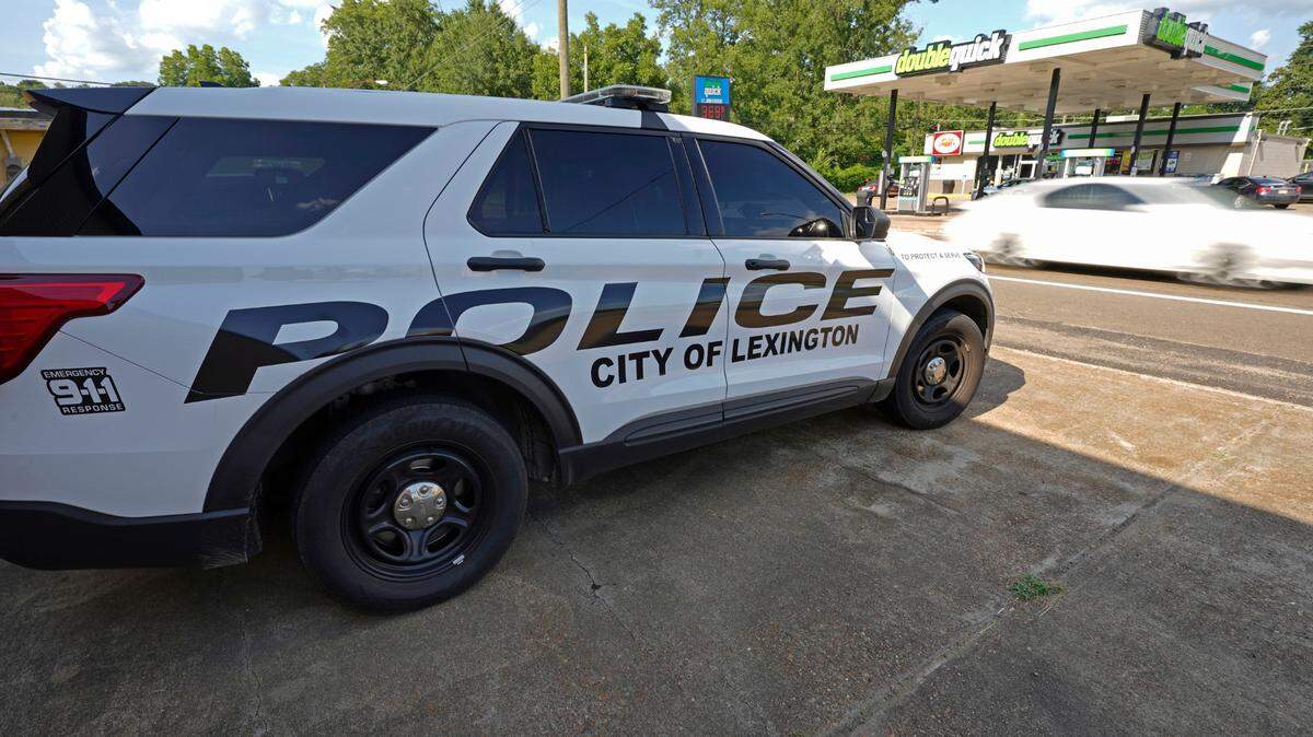 FILE - A Lexington, Miss., police SUV is parked outside their department near the town square, Aug. 15, 2022. The U.S. Justice Department opened an investigation Wednesday, Nov. 8, 2023 into alleged civil rights violations by police in a majority Black Mississippi city. (AP Photo/Rogelio V. Solis, file)