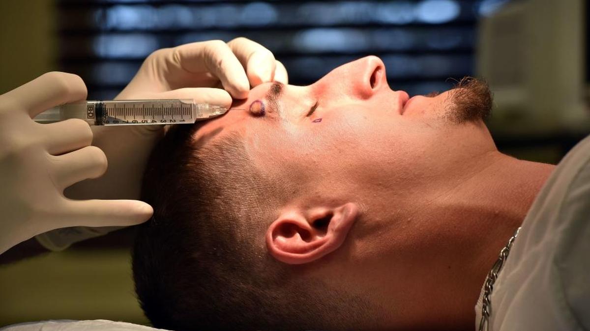 Justin Tolbert, 26, of Philadelphia, formerly a part of the Simon City Royals in Mississippi, undergoes tattoo removal surgery at Blackledge Face Center in Jackson Monday for the gang-related tattoos he wore on his face. Justin Tolbert, 26, of Philadelphia, formerly a part of the Simon City Royals in Mississippi, undergoes tattoo removal surgery at Blackledge Face Center in Jackson Monday. Tolbert had tattoo removal surgery at Blackledge Face Center in Jackson for the gang related tattoos he wore on his face.