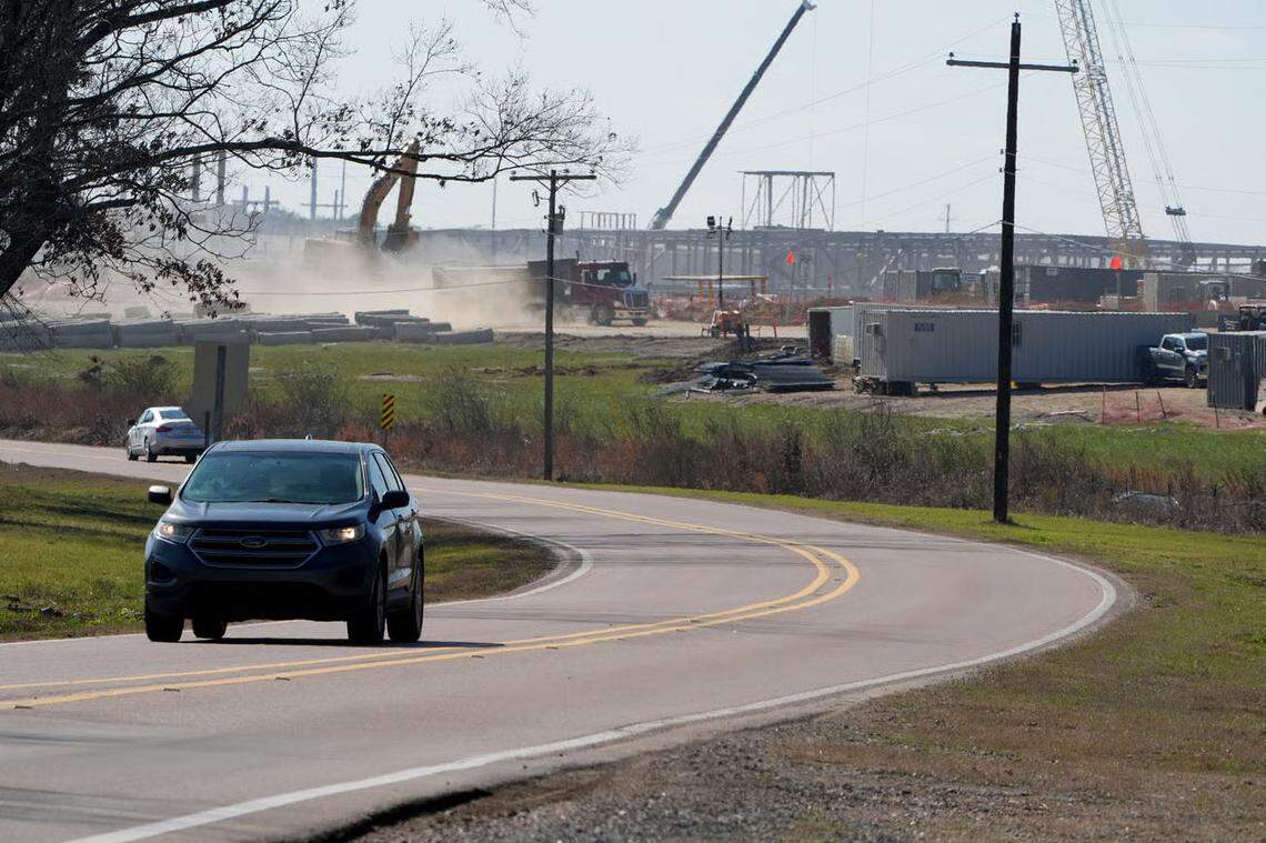 Cars speed past Amazon’s unfinished data center campus in Canton. Since Amazon moved into the property, nearby homeowners have reported a spike in dust and traffic around the site that has made the area noisier and more congested.