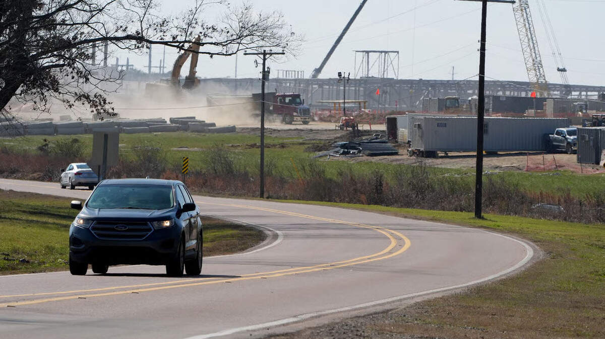 Cars speed past Amazon’s unfinished data center campus in Canton. Since Amazon moved into the property, nearby homeowners have reported a spike in dust and traffic around the site that has made the area noisier and more congested.