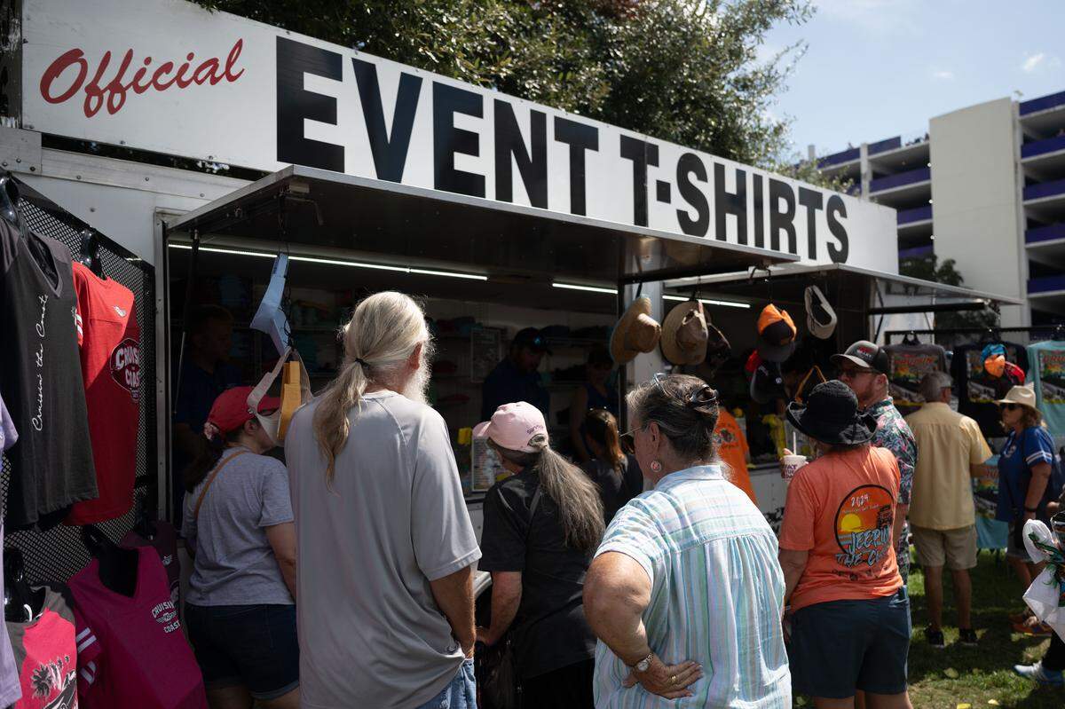 A stand sells event shirts for Cruisin’ The Coast during the Biloxi Block Party.