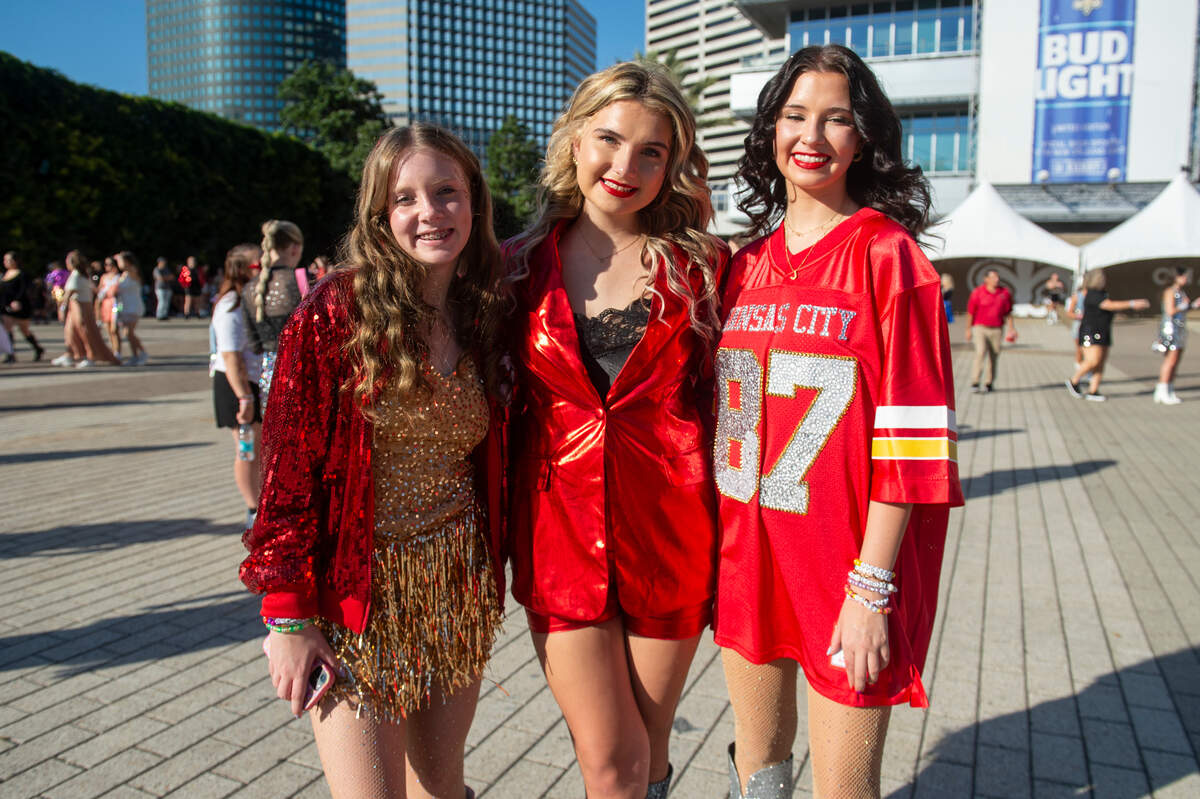 Fans show off their outfits outside the Cesars Superdome in New Orleans on Friday, Oct. 25, 2024, before Taylor Swift’s Eras Tour performance that night.