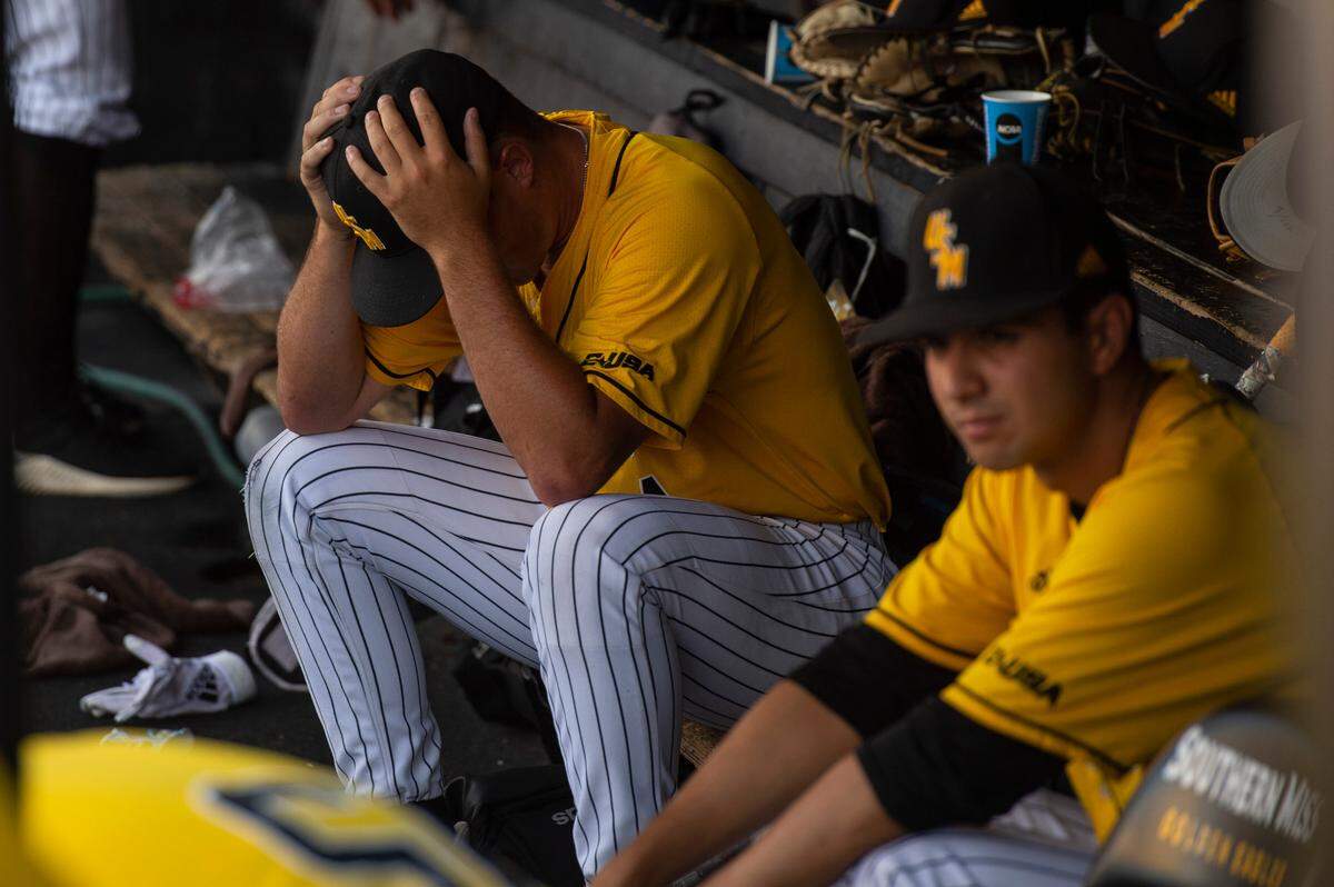 Southern Miss reacts after losing their chance at going to the College World Series during the Super Regionals Final at Pete Taylor Park in Hattiesburg on Sunday, June 12, 2022.